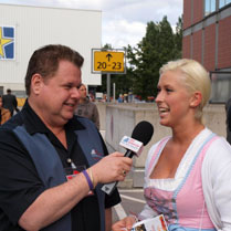 Dave interviews a Bavarian  girl at IFA's Oktoberfest