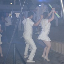 Rob at NCL's White Hot Party  dancing with the Cruise Staff