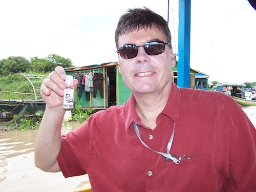 Eric and his Into Tomorrow hand sanitizer in Cambodia