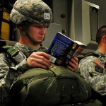 100621-F-6350L-156        U.S. Army Pfc. Kyle Somerlot, with the 330th Transportation Brigade, reads a book aboard a C-17 Globemaster III cargo aircraft as he awaits his turn to perform an airborne insertion during a joint forcible entry exercise at Pope Air Force Base, N.C., on June 21, 2010.  A joint forcible entry exercise is a weeklong exercise conducted six times a year by soldiers from Fort Bragg and airmen at Pope that is designed to enhance cohesion between the Army and Air Force through large-scale heavy equipment and troop movements.  DoD photo by Staff Sgt. Angelita M. Lawrence, U.S. Air Force.  (Released)
