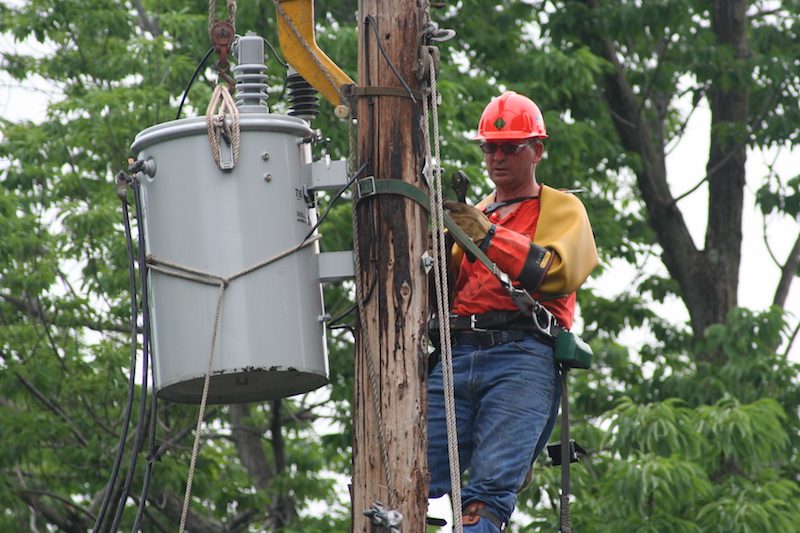 Lineman changing transformer