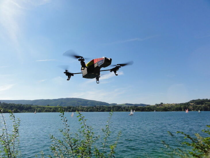 Drone flying over lake