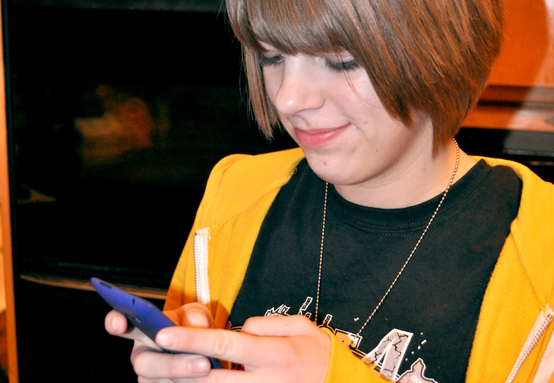 Teen with phone