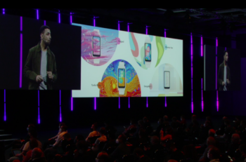 Honor's smartwatches on a large screen above the stage